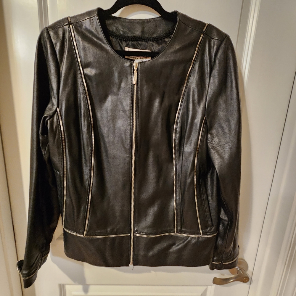 Bradley black leather jacket size large with unique zippers design